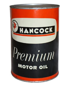 Hancock Premium Metal 1 Quart Oil Can. Round red and black can with vivid colors. A red rooster is featured on the top left beside “HANCOCK” with “Premium MOTOR OIL” written below in white letters.