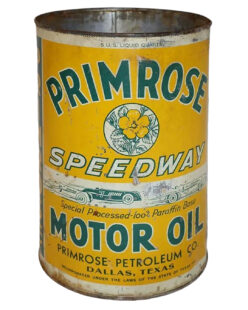 Primrose Speedway Metal 5 Quart Oil Can. Yellow can with some wear and rust. “PRIMROSE MOTOR OIL” is written across the can in large green letters. A primrose graphic is featured in the center with “SPEEDWAY” written underneath. “PRIMROSE PETROLEUM CO.” and “DALLAS, TEXAS” are written small black letters across the bottom.