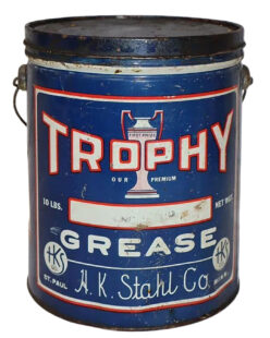 Trophy 10 Pound Grease Can. Blue can with black top. Some wear and discoloration. “TROPHY’ is written across the top in large red and white letters over a trophy graphic. “GREASE” is written below in white letters with “H.K. Stahl Co” and “St. Paul Minnesota” written across the bottom.