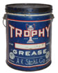 Trophy 10 Pound Grease Can. Blue can with black top. Some wear and discoloration. “TROPHY’ is written across the top in large red and white letters over a trophy graphic. “GREASE” is written below in white letters with “H.K. Stahl Co” and “St. Paul Minnesota” written across the bottom.