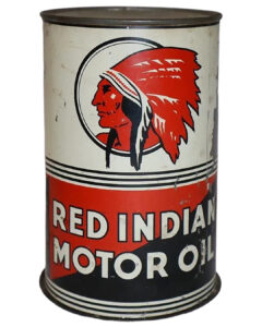 Red Indian Imperial 1 Quart Metal Oil Can. Round, metal can with some wear. White, red, and black colors. A red Indian chief graphic is featured at the top. “RED INDIAN MOTOR OIL” is written in large white letters at the bottom.